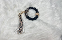 Load image into Gallery viewer, Black Leopard Wristlet with Leopard Tassel
